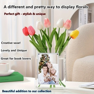 Detail of book-shaped acrylic vase with colorful tulips and family photo frame