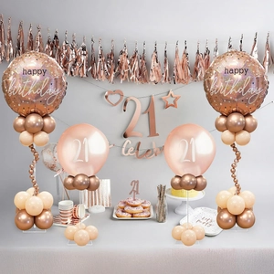 Rose gold 21st birthday decor set with balloon stands and metallic fringe backdrop