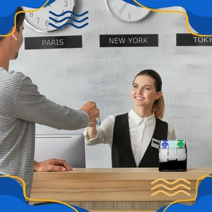 Adjustable black acrylic 3-roll label dispenser used for hotel check-in desk organization