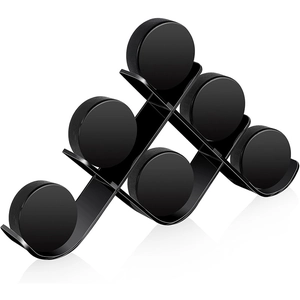 Wall-mounted black acrylic hockey puck display rack holding six collectible pucks