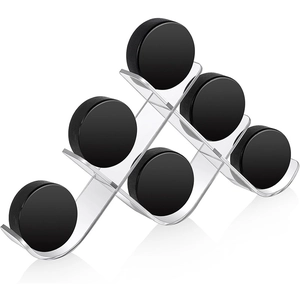 Clear acrylic tiered hockey puck display stand holder for sports memorabilia on white background
