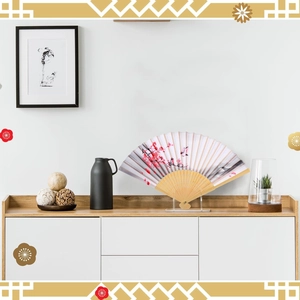 Acrylic display stand holding a Japanese folding fan with cherry blossom and bird patterns