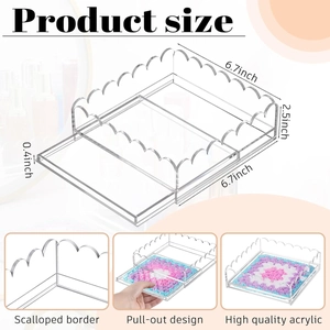 Detail of clear acrylic tray with scalloped edges and pull-out photo insert design