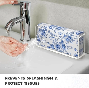 Clear acrylic towel holder protects guest napkins from water splashes on bathroom vanity
