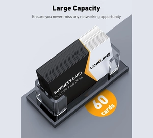 Detail view of transparent acrylic business card holder with high-capacity black base