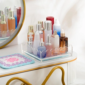 Clear acrylic wavy tray organizer with elegant ripple edges for vanity storage