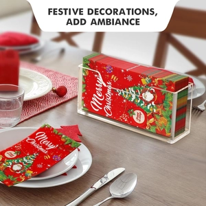 Clear acrylic napkin holder featuring festive Christmas paper on a dining table setup