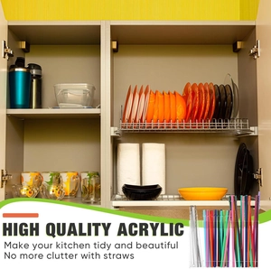 Close-up of clear acrylic straw holder organizer with colored straws and cleaning brush tool