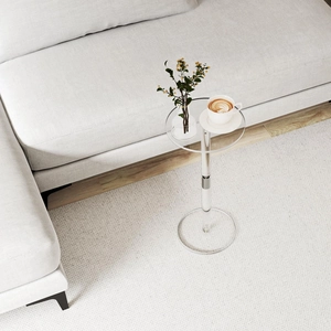 Modern minimalist clear acrylic side table with height-adjustable metal post for small spaces