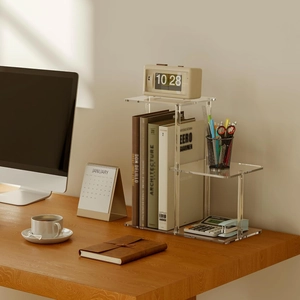 Detail view of a 3-tier clear acrylic desk organizer shelf for books and office decor