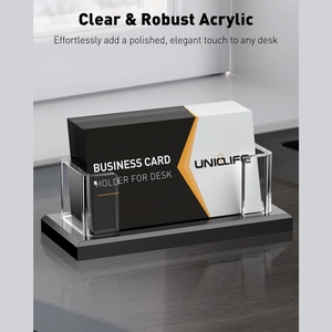 Modern clear acrylic business card holder with glossy black base and robust design