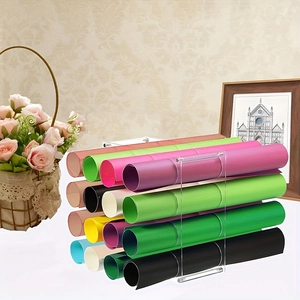Detailed view of clear acrylic storage rack holding multiple colorful vinyl rolls