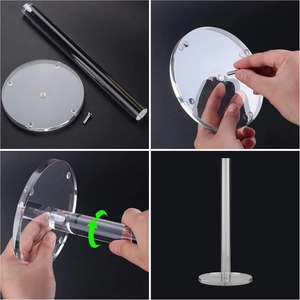 Detail showing the assembly of the clear acrylic paper towel holder with screw and base