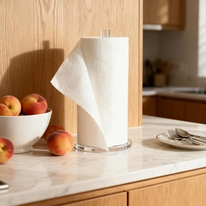 Macro view of transparent acrylic paper towel holder base on white marble surface