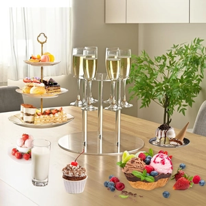 Detailed view of clear acrylic tiered cupcake stand and rotating wine glass holder for parties