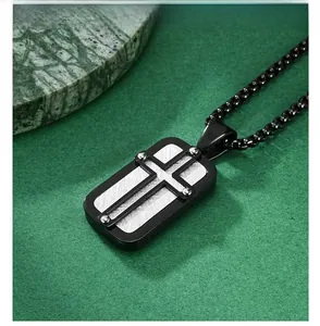 Detailed macro of a black stainless steel military cross pendant with mechanical rivets