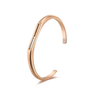 Bracelet jonc en acier inoxydable or rose avec incrustation de cristaux et fini poli