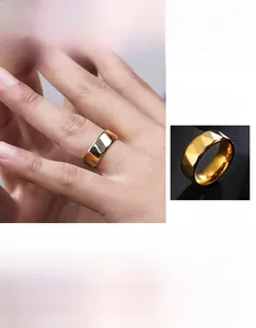 Detailed macro view of men's gold plated faceted tungsten style stainless steel ring surface