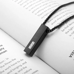 Brushed black stainless steel cylinder necklace with three cubic zirconia stones