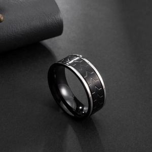 Men's stainless steel ring with black matte chevron tire pattern and silver polished edges