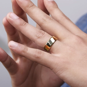 Men's faceted gold plated stainless steel ring with minimalist geometric design