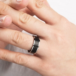 Men's titanium steel tire tread ring with black matte center and silver polished edges