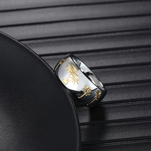 Polished titanium steel men's ring featuring three golden palm tree relief decorations