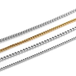 Polished stainless steel chain set featuring silver box, gold wheat, and curb chain styles
