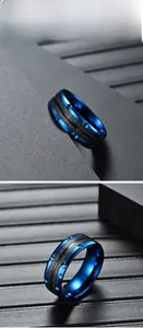 Macro detail of men's blue plated ring with black carbon fiber inlay and geometric edges
