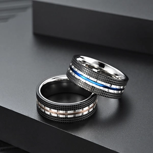 Two-piece men's stainless steel ring set with black grid texture and blue or rose gold inlay