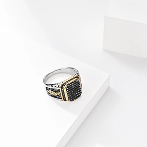 Vintage men's stainless steel ring with black stones and gold feather relief