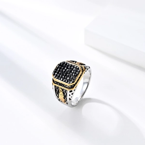 Vintage stainless steel men's signet ring with black zircon stones and golden leaf relief