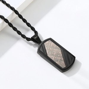 Men's industrial style black pendant necklace with rose gold camo texture on rope chain