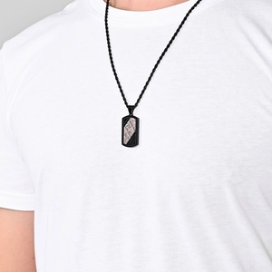 Men's vintage bronze rectangle pendant necklace with twisted rope chain on white tee
