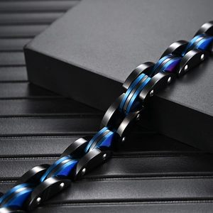 Men's industrial stainless steel bracelet with black and blue mechanical chain links