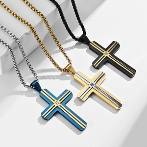Three two-tone religious cross pendants in titanium steel with small center zircons