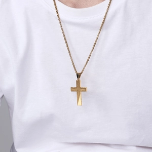Polished gold stainless steel cross necklace with textured edges on a box chain for men