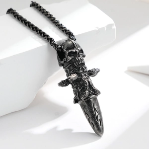 Gothic skull pendant necklace in oxidized steel with bullet shape and woven metal chain