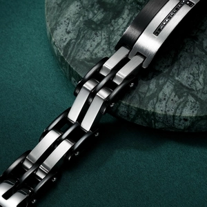 Men's stainless steel chain bracelet with black crystals on green marble base