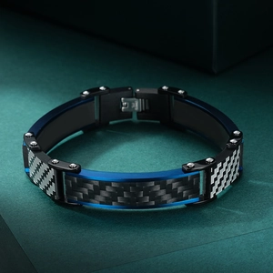Men's blue and black carbon fiber bracelet with stainless steel rivets and fold-over clasp
