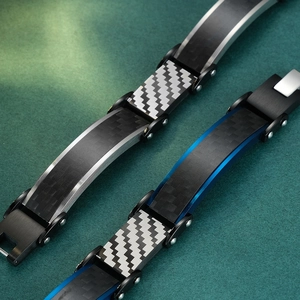 Men's stainless steel bracelet with carbon fiber inlays in black, silver, and blue tones