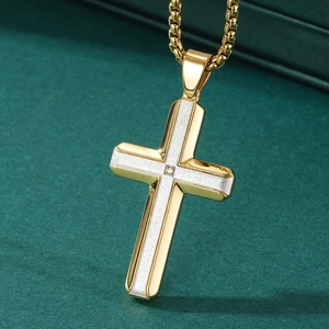 Men's two-tone gold and silver cross necklace with center zircon on a gold box chain