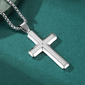 Polished silver stainless steel cross necklace with center zircon and sandblasted finish