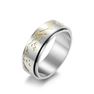Rotating stainless steel star and moon spinner ring with matte finish and zircon