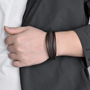 Three-layer braided leather bracelet with stainless steel beads on wrist for men