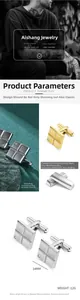 Macro detail of square stainless steel cufflinks with engraved patterns and white crystal