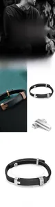 Detail view of men's multilayer leather bracelet with steel accents and magnetic clasp