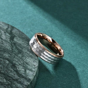 Men's titanium steel ring with silver hammered texture and rose gold inner band