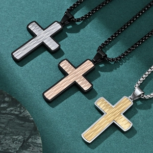 Three cross necklaces with wave textured engraving in gold, silver, and rose gold finishes
