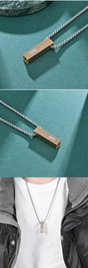 Dettaglio del ciondolo urna rettangolare in oro spazzolato con tre strass e catena a sfere